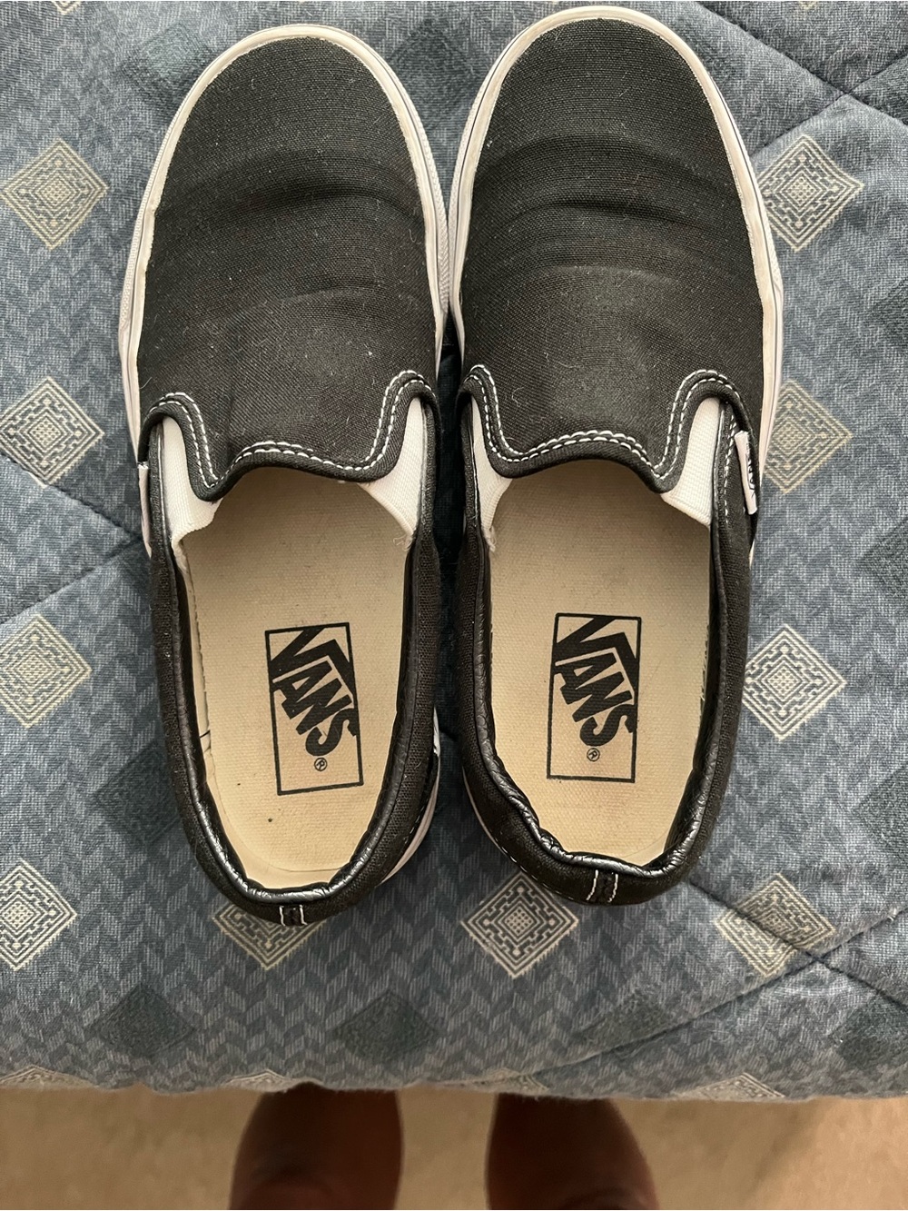 Vans Black and White Slip-On Canvas Sneakers